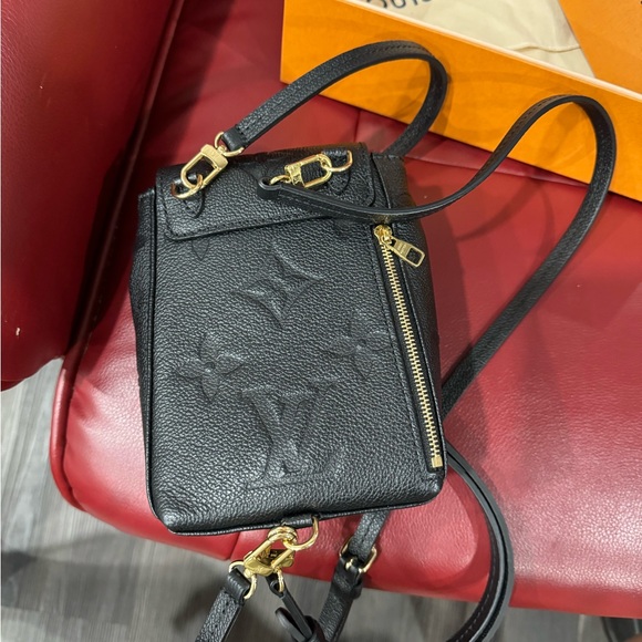 Like new Louis Vuitton black empreiente leather mini backpack - Picture 2 of 7